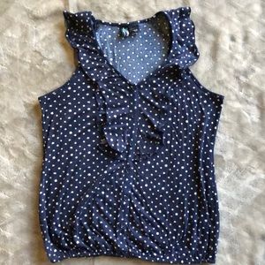 Navy and white polka dotted shirt